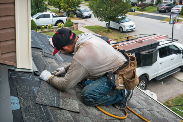 Professional Roof Replacement technician working in Bryant, IL
